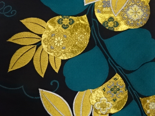  葉に華文模様織出し袋帯